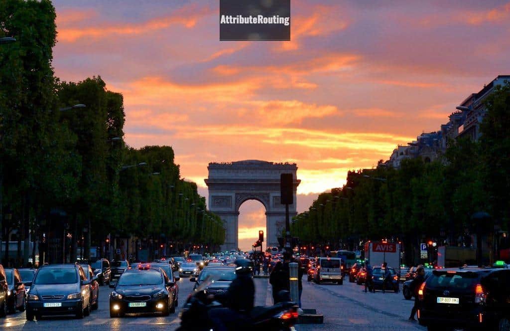 Crowded Street With Cars Along Arc De Triomphe